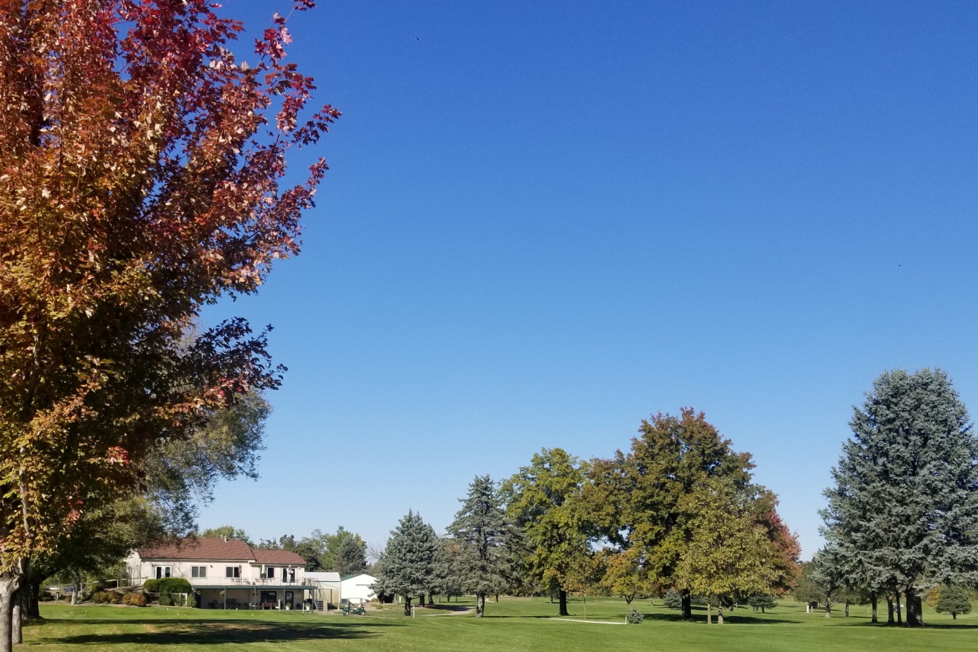 clubhouse on golf course green